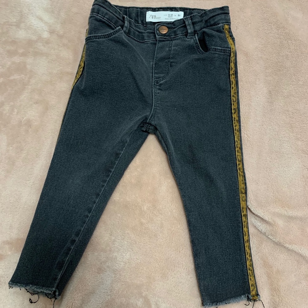 Zara black jeans with cheetah lining on the side